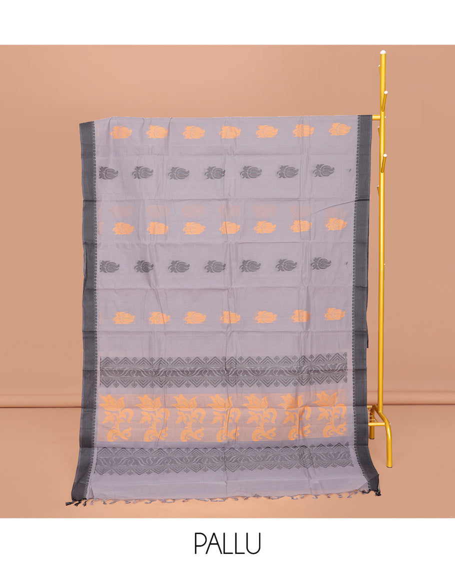 Grey Kanchi Cotton Saree, Decked Up with Buttas All Over Its Body, Complemented by a Contrast Border, Pallu of Floral and Geometric Designs, and Paired with a Matching Blouse