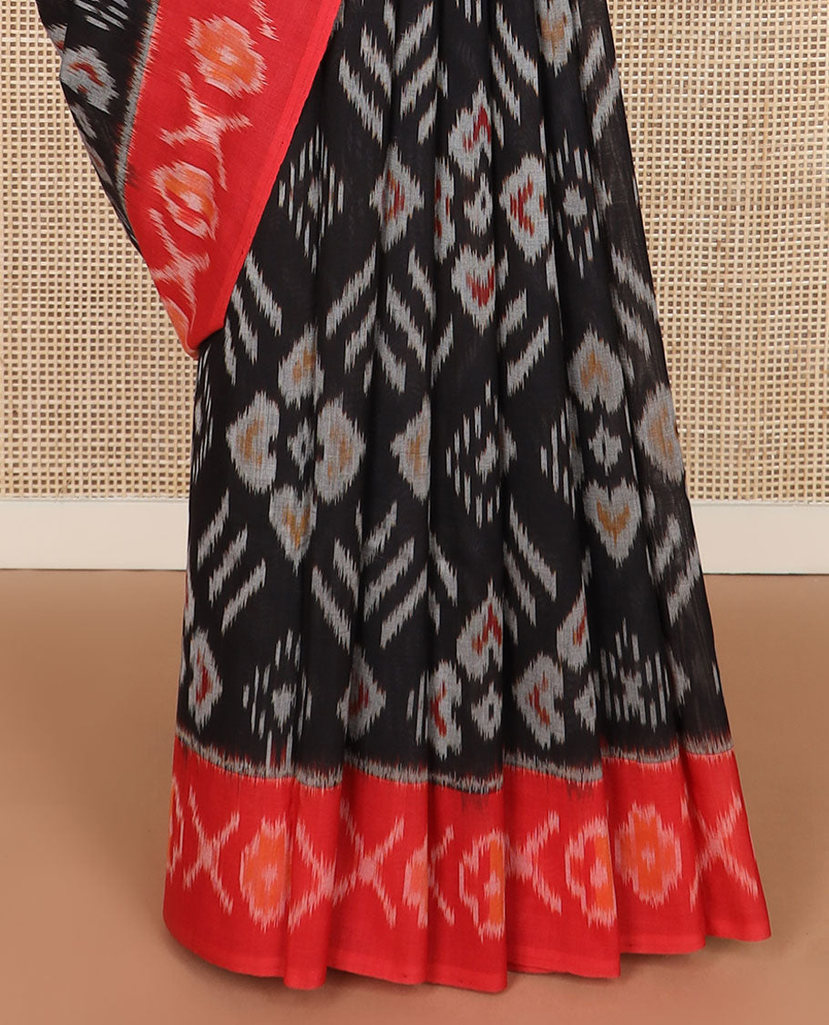 Black buttas ikkat cotton saree, contrast cross & floral motifs, ikat border & ikkat design pallu
