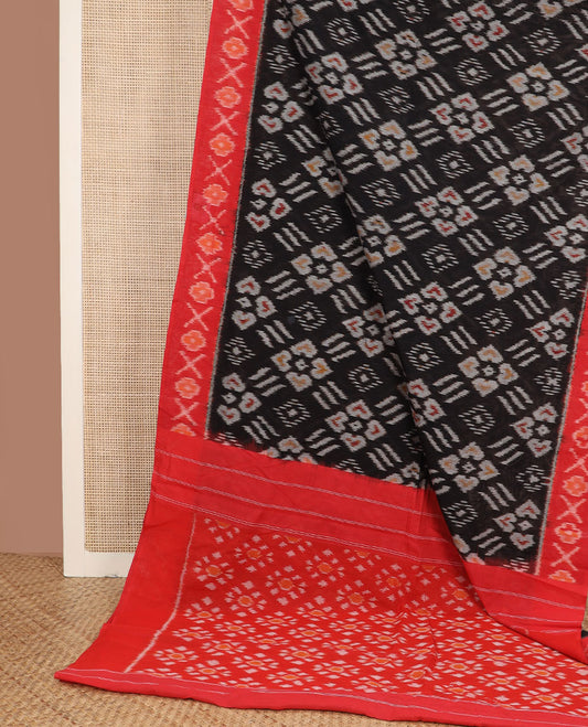 Black buttas ikkat cotton saree, contrast cross & floral motifs, ikat border & ikkat design pallu
