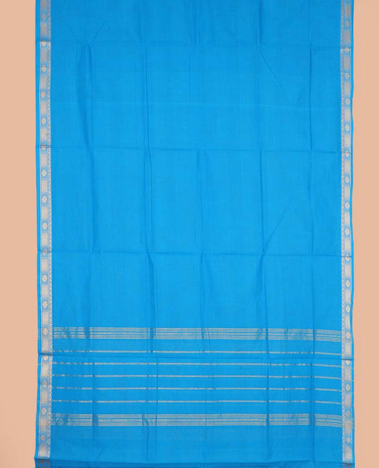 Sky blue plain nine-yard cotton saree, traditional zari border, and striped pallu
