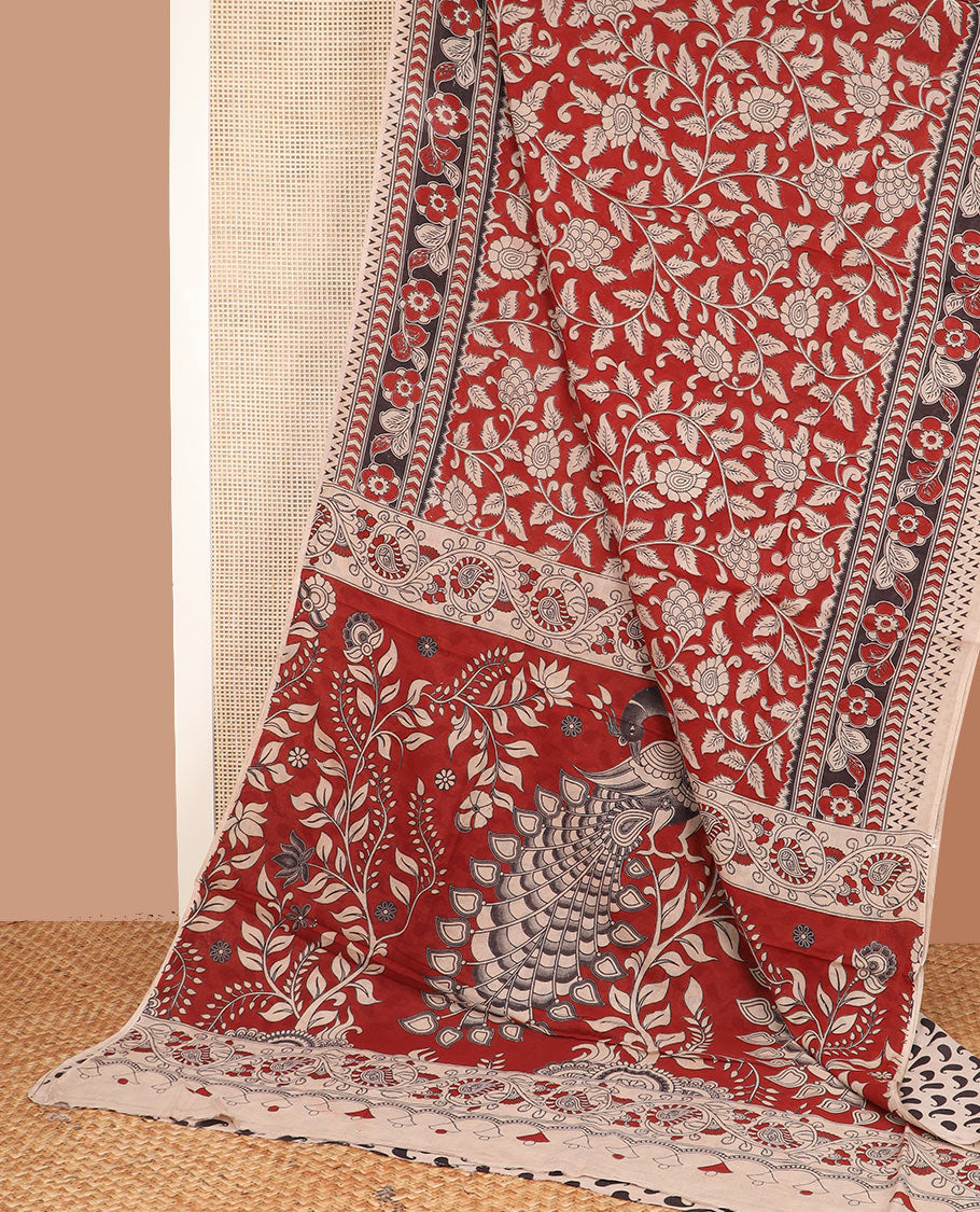 Red floral vine machine-printed Kalamkari cotton saree, contrast floral border, and pallu of floral and peacock
