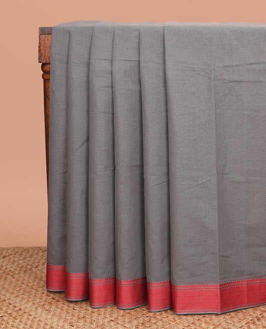 Grey sparesly striped Mangalgiri cotton saree, traditional border, striped pallu, and contrast floral printed blouse