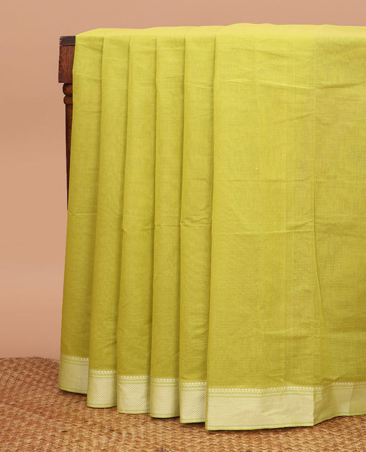 Green striped chirala cotton saree, traditional border, striped pallu, and contrast floral vine printed blouse