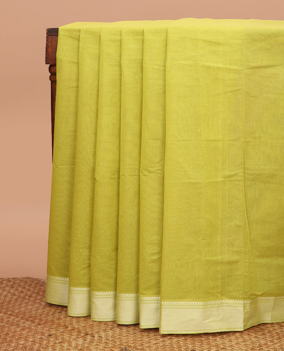 Green striped chirala cotton saree, traditional border, striped pallu, and contrast floral vine printed blouse