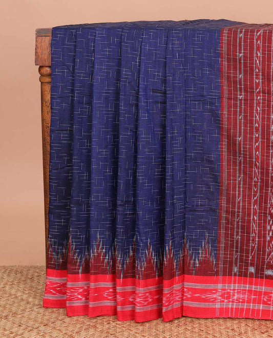 Navy blue geometric maze style ikkat cotton saree, contrast red ikkat border, and pallu of ikkat weave
