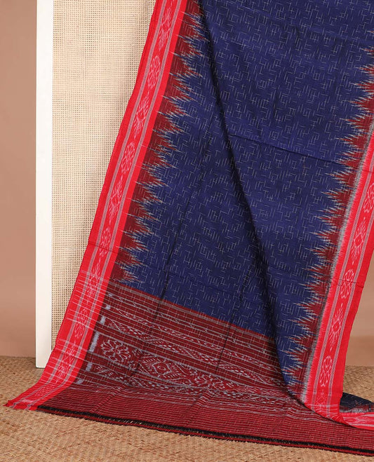Navy blue geometric maze style ikkat cotton saree, contrast red ikkat border, and pallu of ikkat weave