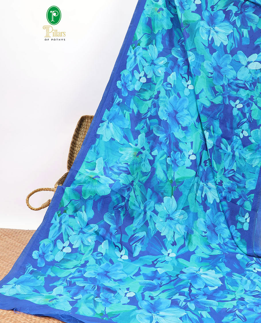 Blue floral digital printed crepe saree with contrast plain border