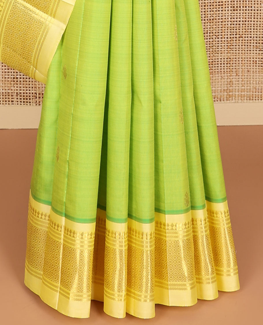 Light green floral buttas kancheepuram silk saree with contrast zari designb order & floral striped design pallu