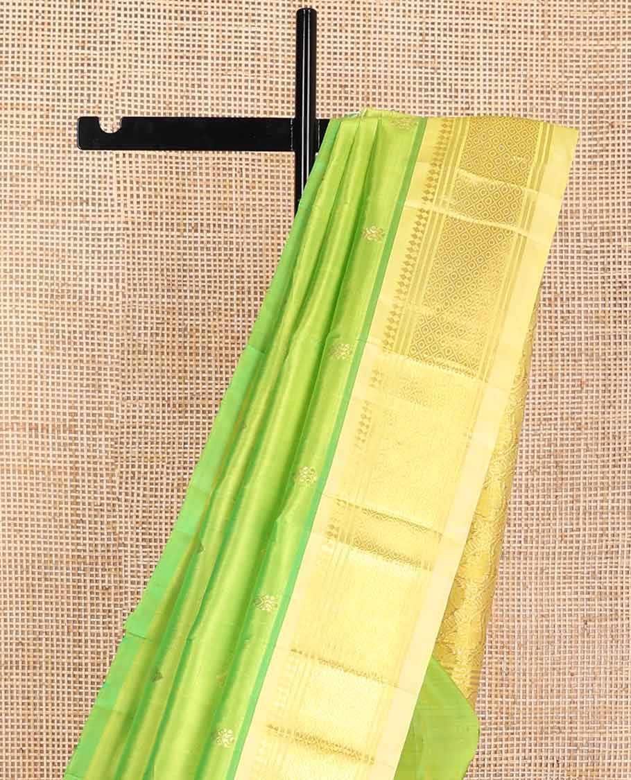 Light green floral buttas kancheepuram silk saree with contrast zari designb order & floral striped design pallu