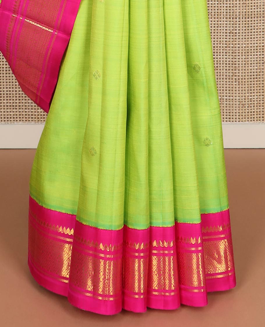 Parrot green zari buttas kanchipuram silk saree, contrast one-sided korvai border of salngai,banaras,muthu & jaal & zari design pallu