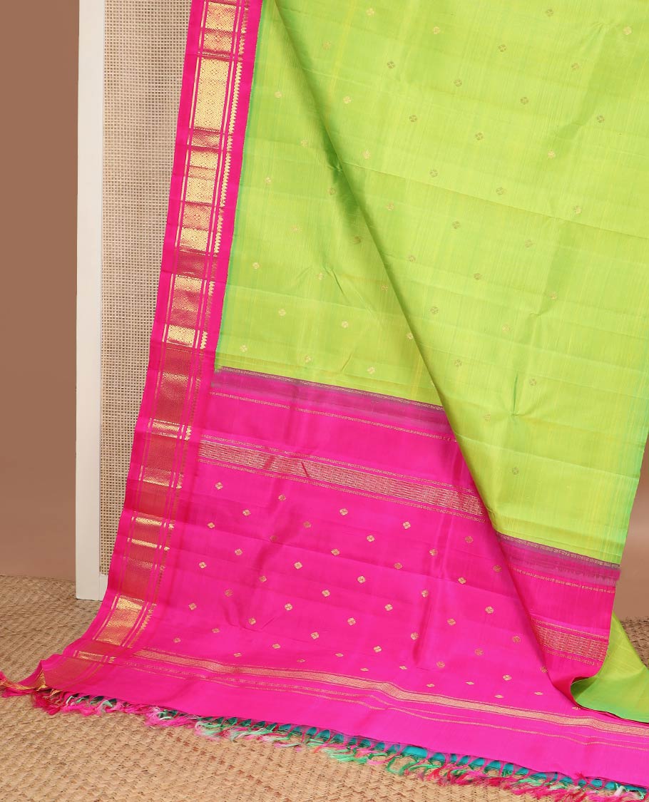 Parrot green zari buttas kanchipuram silk saree, contrast one-sided korvai border of salngai,banaras,muthu & jaal & zari design pallu