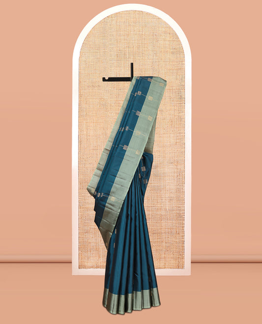Peacock Blue Mayuri Lite Silk Mix Saree, Woven with Zari Buttas, Complemented by a Contrast Border, Sparsely Threaded Pallu, and a Contrast Blouse