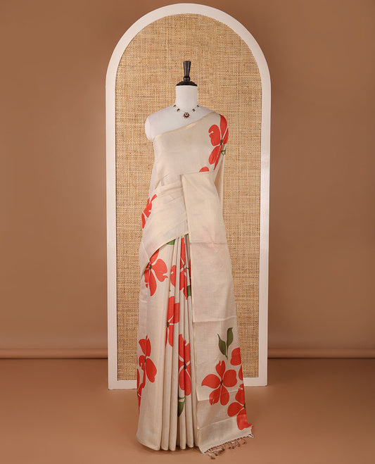 Borderless cream printed onam tissue silk saree features rust color five-petal flower & leaf motifs print, matching floral print blouse