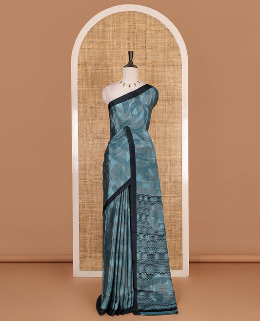 Blue geometric patterns printed Turkey crepe saree, contrast printed piping border, printed pallu, and printed blouse
