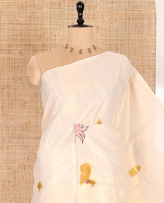 Gold-Mustard Kerala Cotton Saree Subtly Sparked with Handblock-Printed Flora-Fauna-Architecture Motifs, Featuring a Self Pallu with Matching Flora-Fauna-Architecture Handblock Prints, Paired with a Matching Plain Blouse.