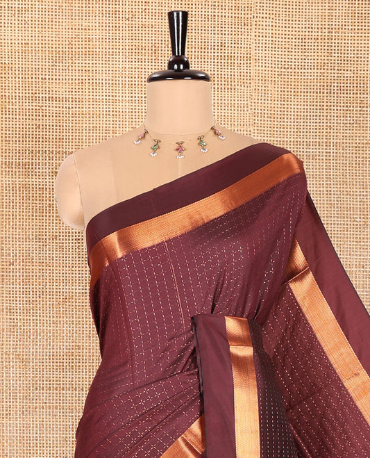 Maroon Semi-Soft Silk Saree Decked Up with Plus-Shaped Buttas All Over the Body, Highlighted with Zari Border, Complemented by Contrast Pallu of Zari Stripes, and Paired with a Contrast Blouse