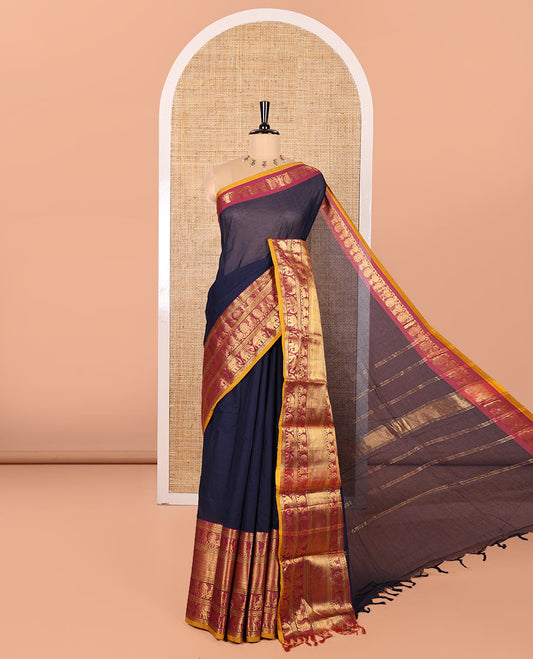 Navy Blue Plain Chettinad Cotton Saree, Complemented by Contrast Traditional Zari Border of Peacock and Elephant Designs, Gleaming Pallu of Stripes, and Paired with a Matching Blouse
