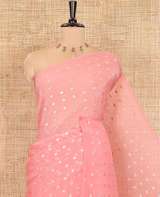 Borderless Peach Shimmer Saree, Beautified with Zari Buttas All Over Its Body, Pallu Mirrors the Same Buttas, and Comes Without a Blouse