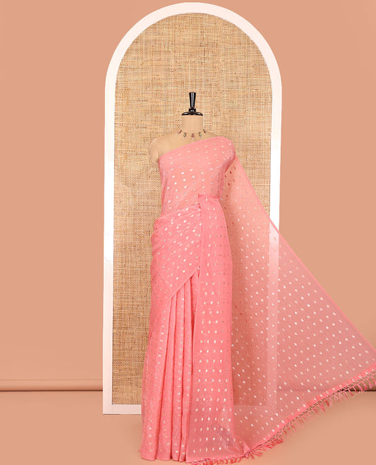 Borderless Peach Shimmer Saree, Beautified with Zari Buttas All Over Its Body, Pallu Mirrors the Same Buttas, and Comes Without a Blouse