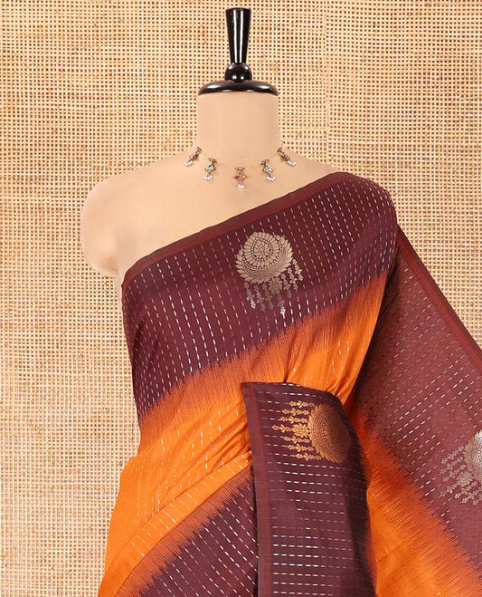 Rust Orange Kanchi Soft Silk Saree, Enriched with Vaira Oosi Stripes, and Zari Buttas All Over Its Body,  Complemented by a Contrast Zari Design Border, an Intricately Designed Pallu, and Paired with a Contrast Blouse