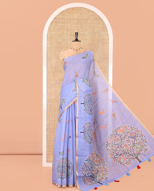 Blue Linen Cotton Saree, Steeped in the Richness of Nature-Themed Motifs Like Bird, Owl, and Tree, a Subtle Piping Border, Pallu of Tree Motifs, and Paired with a Matching Blouse