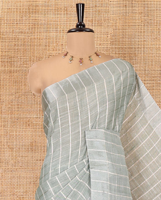 Green Jute Linen Cotton Saree, Adorned with Checked Design on Its Body, a Subtle Self-Border, Striped Pallu, and Paired with a Matching Thread Embroidered Blouse
