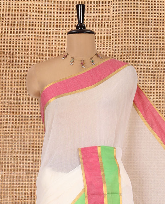 Cream Plain Khadi Mul Cotton Saree, Complemented by Contrast Pink and Green Border, a Self-Pallu, and Has No Blouse