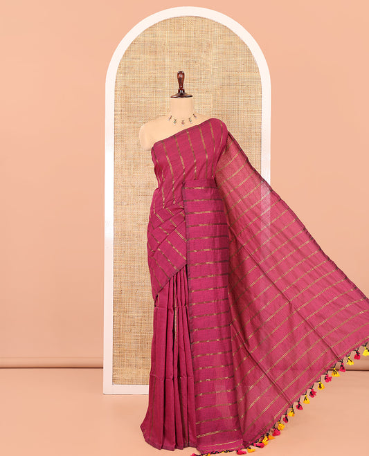 Borderless Magenta Khadi Cotton Saree Features Double Stripes, a Self-Pallu of Tassels, and a Matching Blouse