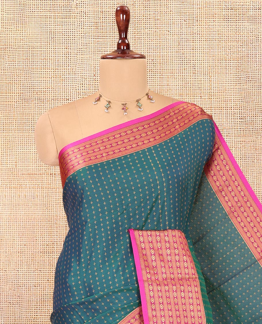 Peacock Green Semi-Soft Silk Saree, Adorned with Plus-Shaped Buttas, Complemented by a Contrast Border, Striped Pallu, and a Contrast Blouse
