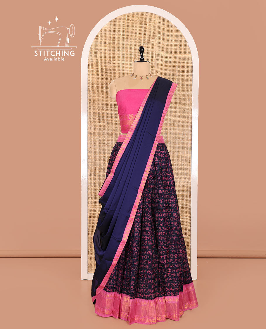 Navy Blue and Pink Printed Sungudi Cotton Half-Saree Showcasing a Skirt Printed with Tamil Letters, Accentuated by a Contrast Traditional Zari Border, a Contrast Blouse, and a Plain Zari-Bordered Dhavani