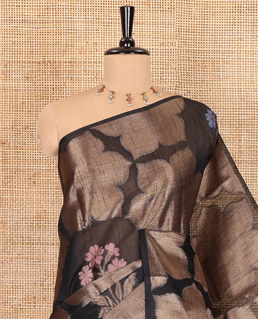 Borderless black zari 6-petal flowers, and colorful floral motifs woven fancy tussar saree, jaal pallu, and a matching jacquard blouse