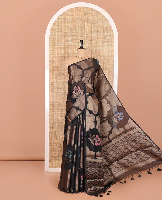 Borderless black zari 6-petal flowers, and colorful floral motifs woven fancy tussar saree, jaal pallu, and a matching jacquard blouse