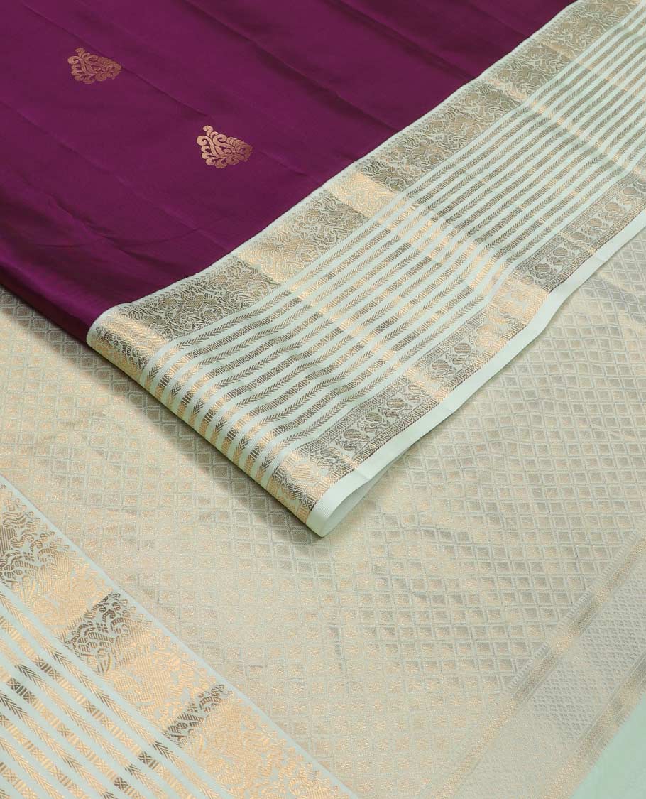 Purple zari buttas Vasundhara silk mix saree, contrast border of yaali, kathir, cross kamalam, and mayil designs, and jaal pallu