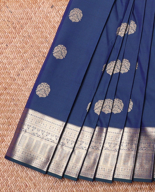 Blue Budget Silk Saree, Decked Up with Zari Buttas on Its Body, Complemented by a Traditional Zari Border, Gracefully Embellished Pallu, and Paired with a Matching Blouse