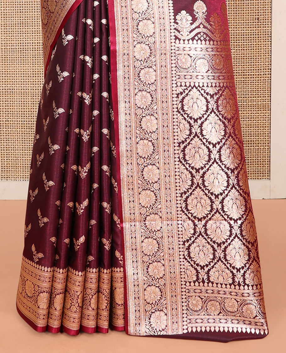 Maroon Banarasi Nylon Saree, Gleamed Up with Buttas, a Floral Creeper Zari Border, Intricate Pallu, and a Matching Blouse