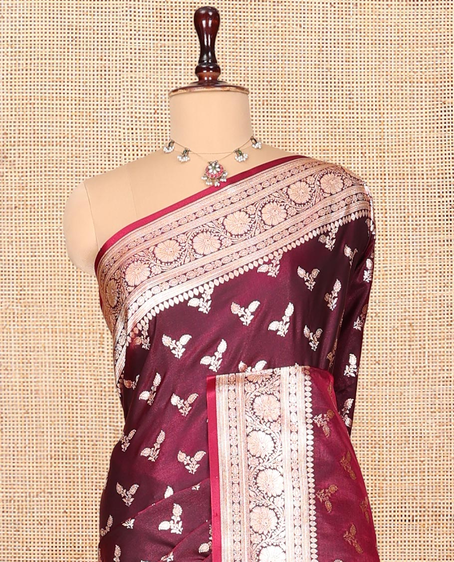Maroon Banarasi Nylon Saree, Gleamed Up with Buttas, a Floral Creeper Zari Border, Intricate Pallu, and a Matching Blouse
