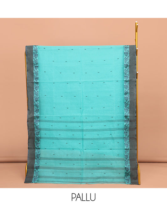 Blue Bengal Cotton Saree, Accentuated with Buttas All Over Its Body, Complemented by a Contrast Floral Creeper Design Border, Pallu of Buttas and Stripes, and Paired with a Matching Blouse
