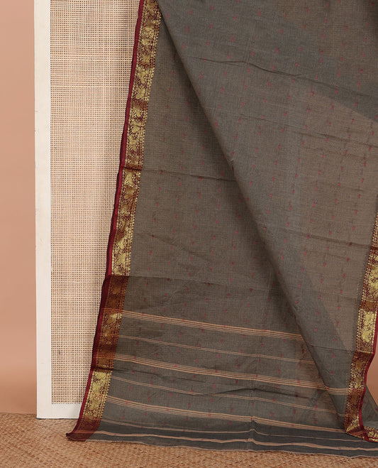 Grey Bengal Cotton Saree, Adorned with Thread Buttas All Over Its Body, Complemented by a Contrast Traditional Zari Design Border, and Pallu Steeped with Stripes