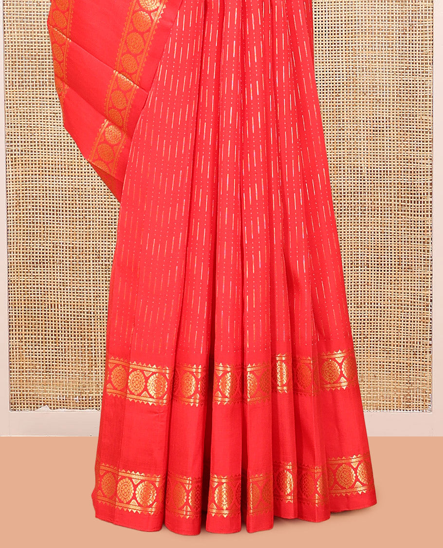 Red Kanchipuram Silk Saree, Woven with Chevron Zari Buttas, Highlighted by a Zari Rettai Pettu Border of Rekku, Banaras, and Chakram Design, Grand Pallu, and No Blouse