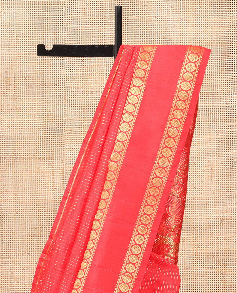 Red Kanchipuram Silk Saree, Woven with Chevron Zari Buttas, Highlighted by a Zari Rettai Pettu Border of Rekku, Banaras, and Chakram Design, Grand Pallu, and No Blouse