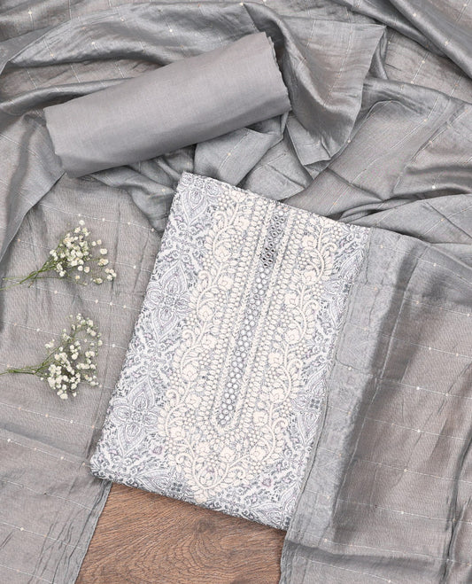 Off-White-Grey Material Chudidar Set, Adorned with Intricate Motifs Print, and Embroidery on Its Jute Cotton Top, a Plain Cotton Bottom, and Paired with Contrast Sequins Striped Chanderi Cotton Dupatta