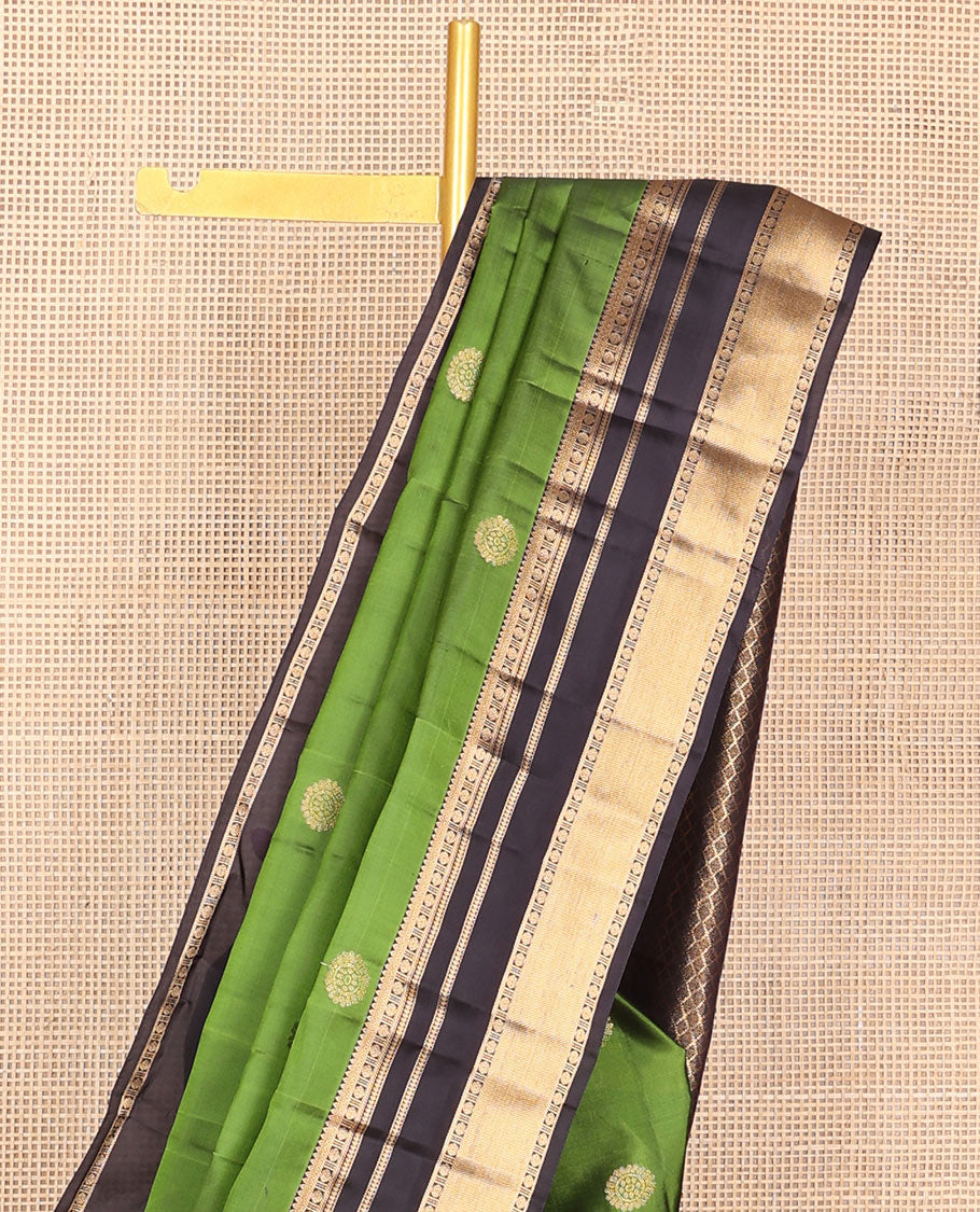 Green chakram zari buttas Vasundhara silk mix saree, contrast rettai pettu border of thilakam,banaras,rudraksham & manga & jaal pallu