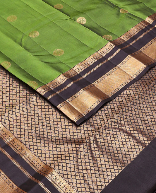 Green chakram zari buttas Vasundhara silk mix saree, contrast rettai pettu border of thilakam,banaras,rudraksham & manga & jaal pallu
