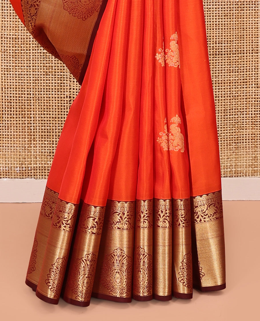 Orange Vasundhara Lite Silk Mix Saree, Accentuated With Zari Buttas All Over Its Body, Complemented by Captivating Contrast Border of Traditional Zari Designs, Grand Pallu of Jaal Designs and Paired with a Contrast Blouse