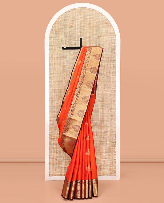 Orange Vasundhara Lite Silk Mix Saree, Accentuated With Zari Buttas All Over Its Body, Complemented by Captivating Contrast Border of Traditional Zari Designs, Grand Pallu of Jaal Designs and Paired with a Contrast Blouse