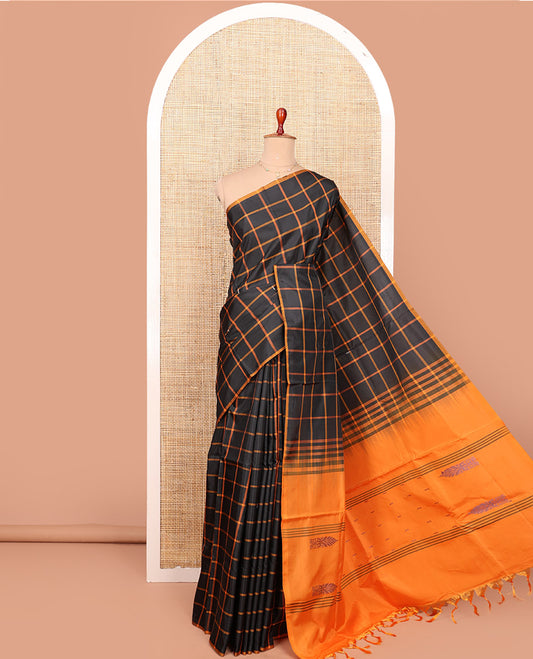 Borderless Black Checked Banana Pith Saree, Complemented by a Contrasting Pallu Steeped with Buttas and Stripes, and Paired with a Contrast Plain Blouse