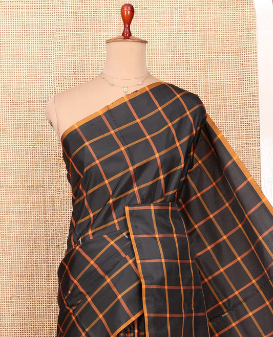 Borderless Black Checked Banana Pith Saree, Complemented by a Contrasting Pallu Steeped with Buttas and Stripes, and Paired with a Contrast Plain Blouse
