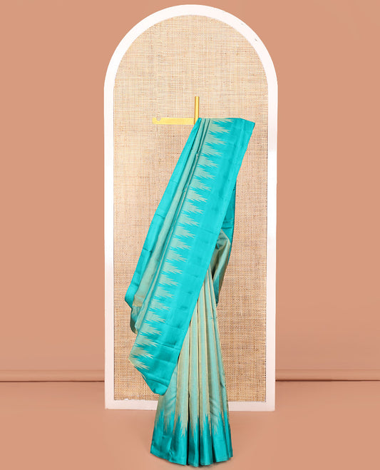 Blue Vasundhara Silk Saree Gleamed Up with Thazampoo Rekku Border, Pallu of Manga, Kodi Visiry, and Thazampoo Rekku Designs, and Paired with a Matching Blouse