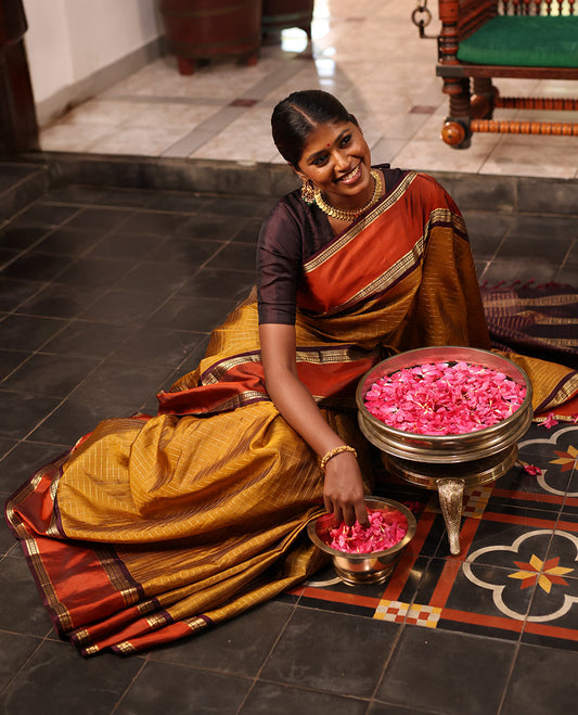 Mehendi Green Kanchipuram Soft Silk Saree Embellished with Medium-sized Zari Checks, Complemented by a Contrast Rettai Pettu Border of Rekku, Banaras, Kathir, and Star Vanki Designs, Pallu Elevated with Zari Designs, and Paired with a Contrast Blouse