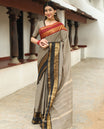 Beige plain chettinad cotton saree, contrast traditional zari rettai pettu ganga jamuna border, striped pallu, and a matching blouse